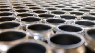 Aluminum cans wait to be filled with craft beer during a production run at Black Plague Brewery in Oceanside, California, U.S., March 14, 2025. 
