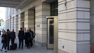 Associated Press members leave the U.S. District Court the day a judge hears arguments in the AP’s bid to restore access for its journalists to cover press events aboard Air Force One and at the White House, after the Trump administration barred the news agency for not using his new name for the Gulf of Mexico in its coverage, in Washington, March 27, 2025.