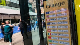 Foreign currencies are advertised in a window in Times Square, one of New York’s and the nation’s top tourist attractions, on March 28, 2025, in New York City.