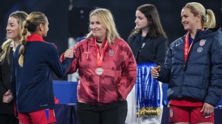 United States head coach Emma Hayes shakes hands with Gisele Thompson #15 of the United States after playing Japan at Snapdragon Stadium on February 26, 2025 in San Diego, California.