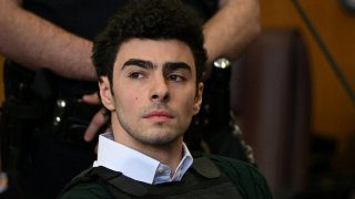 FILE PHOTO: Luigi Mangione, the suspect in the killing of UnitedHealth Group chief executive Brian Thompson, appears in Manhattan Supreme Court on New York state murder and terrorism charges in New York City, U.S., February 21, 2025.