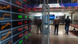 Stock prices on ticker screens inside the Hellenic Exchanges – Athens Stock Exchange SA in Athens, Greece, on Thursday, April 3, 2025.