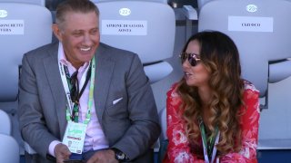 Russian billionaire , businessman Boris Rotenberg (L) listens to his wife Karina Rotenberg (R) during the awarding ceremony at the 2017 Formula 1 Russian Grand Prix in Sochi , Russia, April, 30, 2017.
