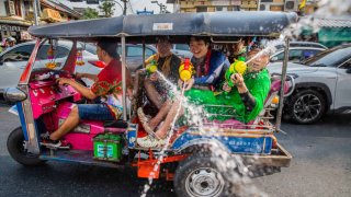 Revelers participate in Thailand’s annual water-splashing festival, Songkran, in April 2023.