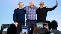 Former Microsoft CEOs Bill Gates, left, and Steve Ballmer, center, pose for photos with CEO Satya Nadella during an event celebrating the 50th Anniversary of Microsoft on April 4, 2025 in Redmond, Washington. 