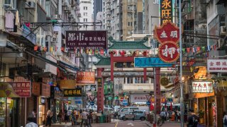 Hong Kong. Kowloon. Busy street in Mong Kok District.