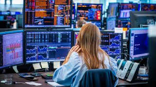 Employees in the trading room of Nordea Markets follow the turmoil and sharp stock market declines following the tariff war that is affecting markets worldwide, in Oslo, Norway, on April 7, 2025.