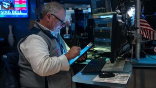 Traders work on the floor of the New York Stock Exchange (NYSE) on April 07, 2025 in New York City.