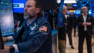 Traders work on the floor of the New York Stock Exchange (NYSE) on April 07, 2025 in New York City.