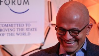 Satya Nadella, CEO of Microsoft, laughs as he attends a session at the World Economic Forum in Davos, Switzerland, on Jan. 23, 2020.