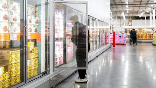 People shop in Bayonne, New Jersey on April 8, 2025.