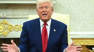 U.S. President Donald Trump speaks during a meeting in the Oval Office on April 7, 2025.