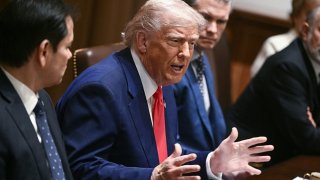 US President Donald Trump, alongside Secretary of State Marco Rubio (L) and Secretary of Defense Pete Hegseth (R), speaks during a cabinet meeting in the Cabinet Room of the White House on April 10, 2025, in Washington, DC.
