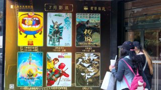 Posters of film ‘Despicable Me 4’, film ‘Stand By Me’ and film ‘A Legend’ are displayed at the entrance of a cinema on July 16, 2024 in Shanghai, China.