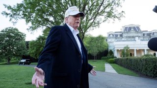 U.S. President Donald Trump answers reporters’ questions after exiting Marine One at the White House in Washington, D.C., on April 27, 2025.