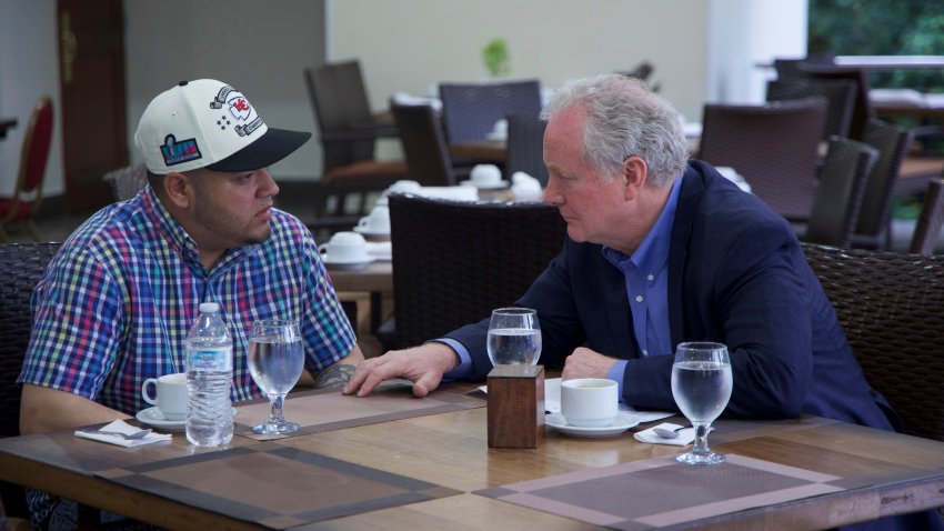 In this photo released by Senator Van Hollen’s press office, Hollen, right, speaks with Kilmar Abrego Garcia, a Salvadoran citizen who was living in Maryland and deported to El Salvador by the Trump administration, in a hotel restaurant in San Salvador, El Salvador, Thursday, April 17, 2025.