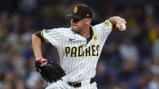 SAN DIEGO, CALIFORNIA – APRIL 9: Tom Cosgrove #59 of the San Diego Padres throws a pitch during the ninth inning against the Chicago Cubs at PETCO Park on April 9, 2024 in San Diego, California. (Photo by Brandon Sloter/Getty Images)