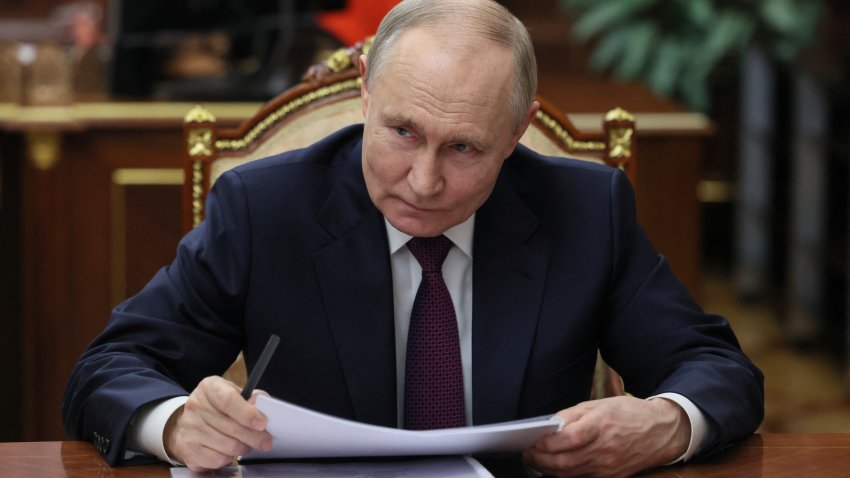 In this pool photograph distributed by Russian state agency Sputnik, Russia's President Vladimir Putin attends a meeting with Head of Republic of Tatarstan in Moscow on March 3, 2025.