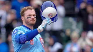 CHICAGO, ILLINOIS – APRIL 5: Ian Happ #8 of the Chicago Cubs receives a standing ovation in recognition of his 1000th career game in the bottom of the first inning in a game against the San Diego Padres at Wrigley Field on April 5, 2025 in Chicago, Illinois. (Photo by Matt Dirksen/Chicago Cubs/Getty Images)