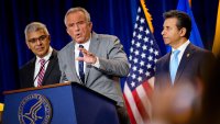 WASHINGTON, DC – APRIL 22: Health and Human Services Secretary Robert F. Kennedy Jr., accompanied by National Institutes of Health Director Jayanta Bhattacharya (L), and Food and Drug Administration Commissioner Marty Makary (R) speaks during a news conference at the Health and Human Services Department on April 22, 2025 in Washington, DC. Kennedy and Makary spoke about the intent of the FDA “to phase out the use of petroleum-based synthetic dyes in the nation’s food supply.” (Photo by Andrew Harnik/Getty Images)