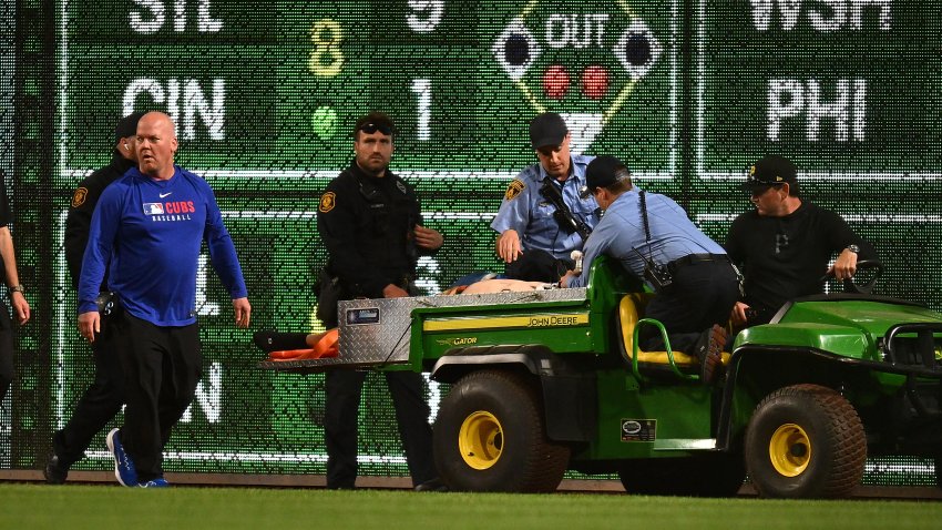 PITTSBURGH, PENNSYLVANIA – APRIL 30: A fan is carted off the field after falling from the stands during the seventh inning of the game between the Chicago Cubs and the Pittsburgh Pirates at PNC Park on April 30, 2025 in Pittsburgh, Pennsylvania. (Photo by Joe Sargent/Getty Images)