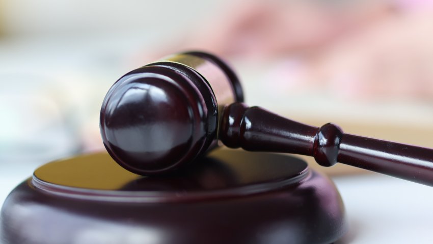 Judge’s wooden gavel on table. Judicial decisions in civil cases concept