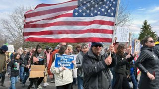 Protestors march near White House border czar Tom Homan’s home