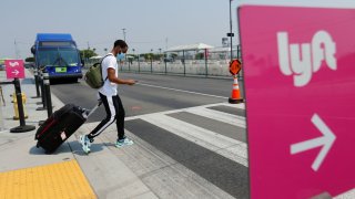 An empty Lyft pick-up area is shown as rideshare drivers hold a rally as part of a statewide day of action to demand that ride-hailing companies Uber and Lyft follow California law and grant drivers “basic employee rights”, in Los Angeles, California, U.S., August 20, 2020.