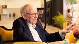 Warren Buffett walks the floor and meets with Berkshire Hathaway shareholders ahead of the annual meeting in Omaha, Nebraska, on May 3, 2024.