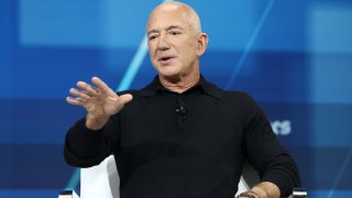 Jeff Bezos, founder and executive chairman of Amazon, takes the stage during The New York Times’ annual DealBook Summit, at Jazz at Lincoln Center in New York City on Dec. 4, 2024.