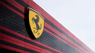 The Ferrari logo is seen outside the Ferrari headquarters in Maranello, Italy.