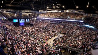In this seven image composite, shareholders gather prior to the start of the Berkshire Hathaway annual meeting in Omaha, Nebraska, U.S., on Saturday, May 1, 2010.