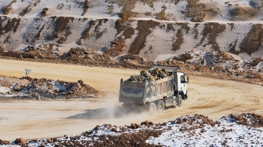 Earth and minerals are loaded onto trucks at an open-pit mine near the frontline, despite the threat of bombing by Russian invading forces on February 26, 2025 in Donetsk Region, Ukraine.