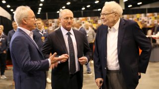 Warren Buffett and Greg Abel walkthrough the Berkshire Hathaway Annual Shareholders Meeting in Omaha, Nebraska on May 3, 2025.