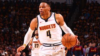 Russell Westbrook, #4 of the Denver Nuggets, dribbles the ball during the game against the Oklahoma City Thunder during Round 2, Game 1 of the 2025 NBA Playoffs at Paycom Center in Oklahoma City, Oklahoma, on May 5, 2025.