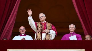 Newly elected Pope Leo XIV, Robert Prevost addresses the crowd on the main central loggia balcony overlooking St Peter’s Square on May 08, 2025 in Vatican City, Vatican.