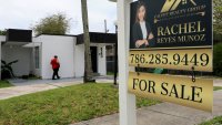 A For Sale sign sits in front of a home on May 12, 2025 in Miami, Florida.