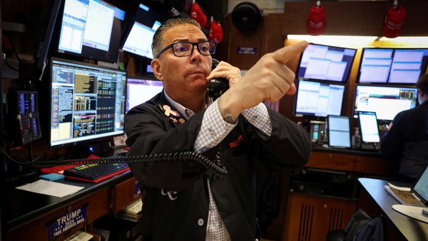 A trader works on the floor at the New York Stock Exchange on May 12, 2025.