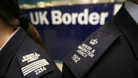 Immigration officers at Gatwick’s border control.