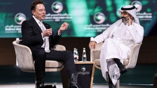 Tesla CEO Elon Musk speaks, as he sits with Saudi Minister of Communications and Information Technology Abdullah Alswaha, at the Saudi-U.S. Investment Forum, in Riyadh, Saudi Arabia, on May 13, 2025.