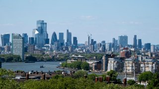 Skyline view of the City of London financial district from the viewpoint in Greenwich Park in London, United Kingdom.