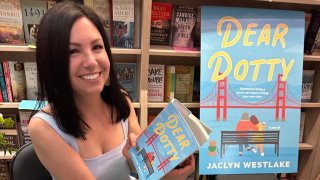 Jaclyn Westlake poses at a book signing for her first novel, “Dear Dotty.”