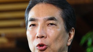 Japan’s farm minister Taku Eto responds to questions from media after submitting his resignation to Prime Minister Shigeru Ishiba at the prime minister’s office in Tokyo on May 21, 2025.