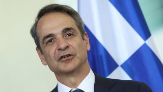 Greek Prime Minister Kyriakos Mitsotakis and German Chancellor Friedrich Merz (not pictured) speak to the media following talks at the Chancellery on May 13, 2025 in Berlin, Germany.