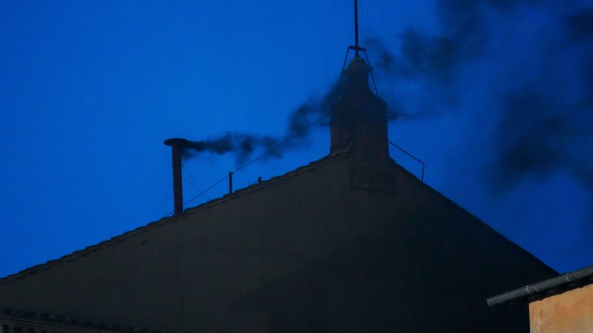 Black smoke billows from the chimney of the Sistine Chapel, where 133 cardinals are gathering on the first day of the conclave, indicating that a successor of late Pope Francis was not elected, Wednesday, May 7, 2025.