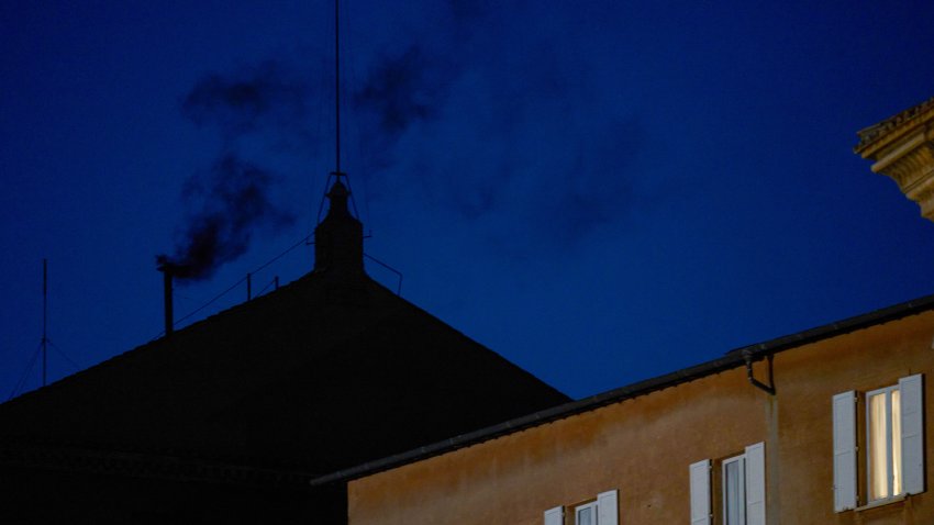 Black smoke billows from the chimney of the Sistine Chapel, where 133 cardinals are gathering on the first day of the conclave, indicating that a successor of late Pope Francis was not elected, Wednesday, May 7, 2025.