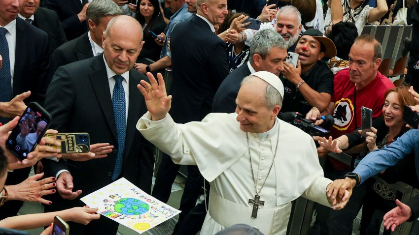 VATICAN, ITALY – 2025/05/12: Pope Leo XIV walks and shakes hands at the end of a special audience with thousands of journalists and media workers in the Paul VI Hall in Vatican City. The audience with journalists has become a tradition for newly elected popes. (Photo by Salvatore Laporta/KONTROLAB/LightRocket via Getty Images)
