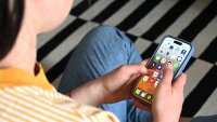 A teenager using a smartphone