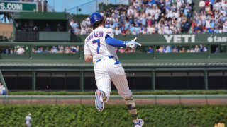 CHICAGO, IL – MAY 17: Dansby Swanson #7 of the Chicago Cubs celebrates as he rounds the bases after hitting a home run during the game between the Chicago White Sox and the Chicago Cubs at Wrigley Field on Saturday, May 17, 2025 in Chicago, Illinois. (Photo by George Gaza/MLB Photos via Getty Images)