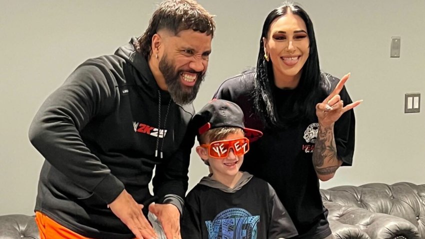 Trey Gogerty with Jey Uso and Rhea Ripley